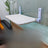 Hanging window cat bed attached with suction cups