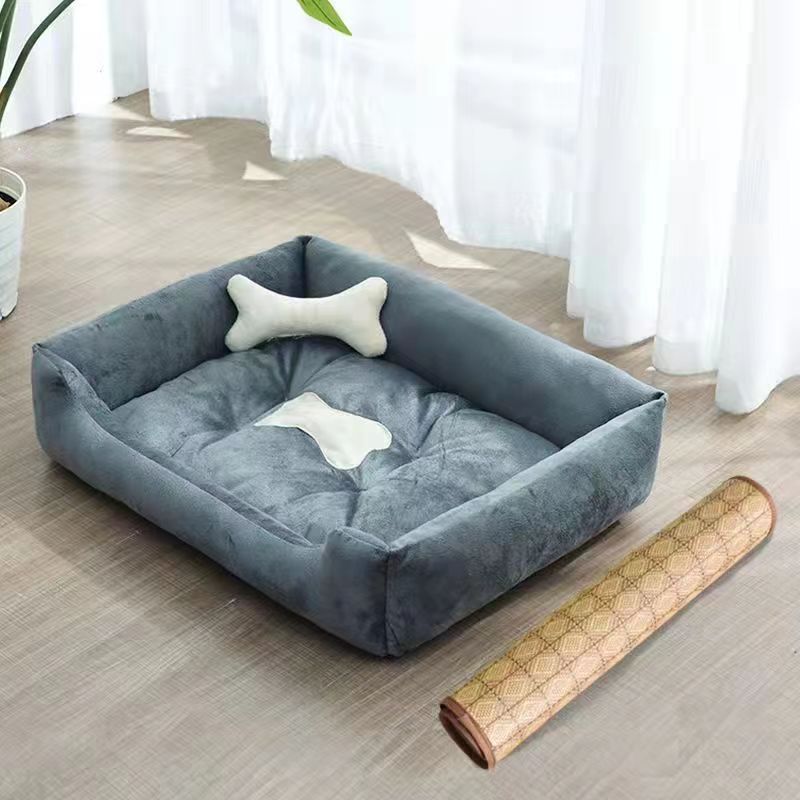 Soft pet bed with blanket, mat and bone pillow, detail and texture view