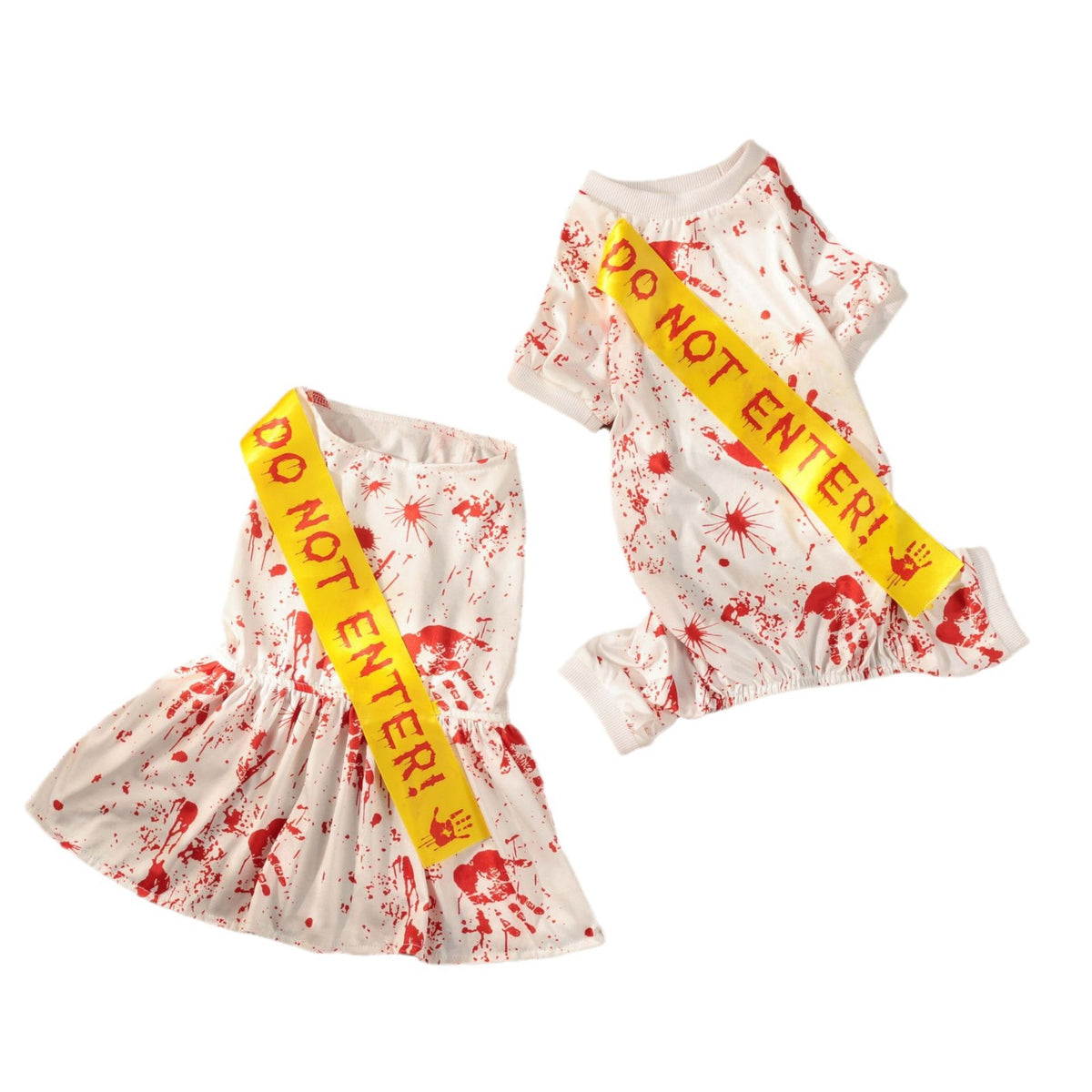 Small dog wearing a blood splatter print Halloween costume