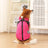 Warm padded cotton dog coat with reflective straps in Black, in a home setting