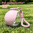 Foldable pet water bottle with ball outlet in Blue, in a home setting