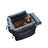 Small dog travelling in a black portable car seat bed