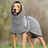 Dog wearing a soft lake blue polar fleece jumper