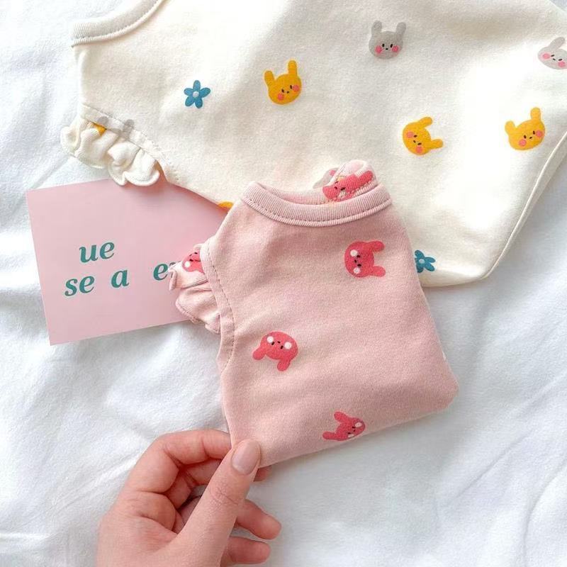 Lightweight flutter sleeve pet vests in pink and white