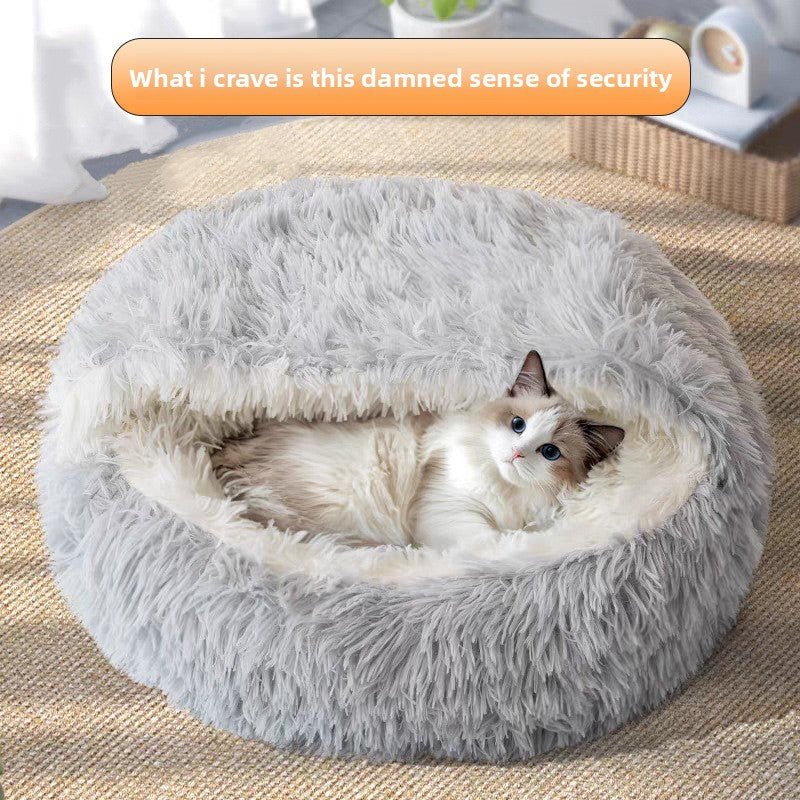 Semi-enclosed shell cat bed in soft plush, close-up detail view