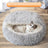 Semi-enclosed shell cat bed in soft plush, close-up detail view