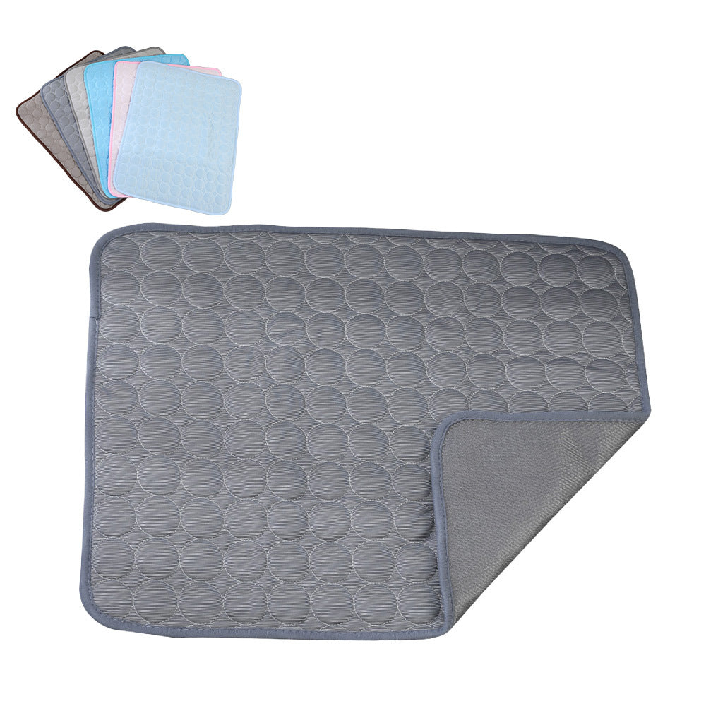 Dog lying on a dark grey non-slip summer pad