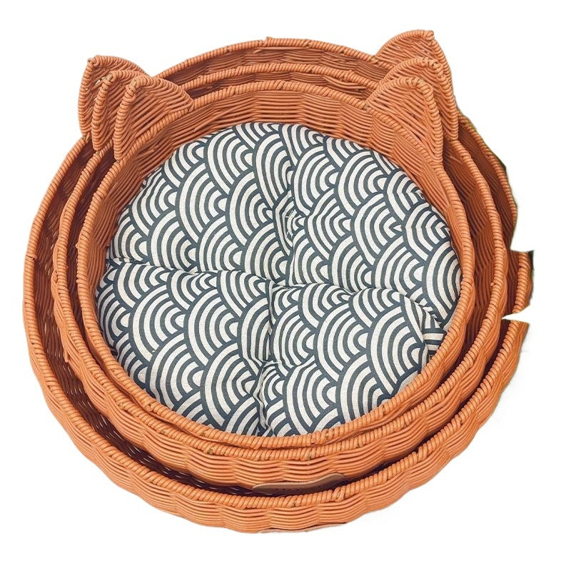 Brown rattan woven pet bed with blue cushion for cats, view 5