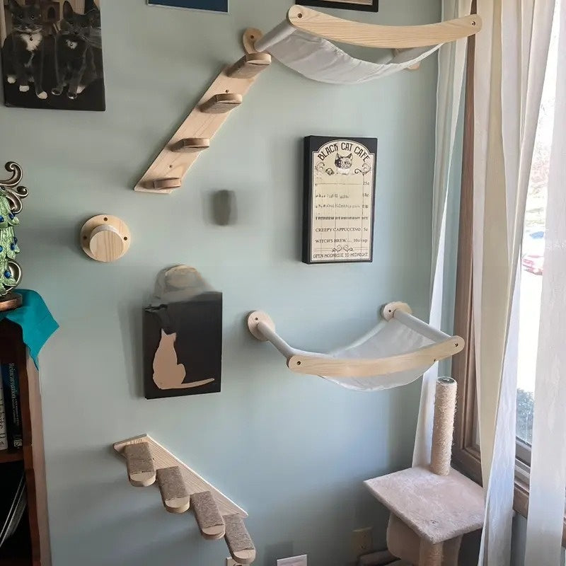 Four-step wooden cat climbing ladder on a wall
