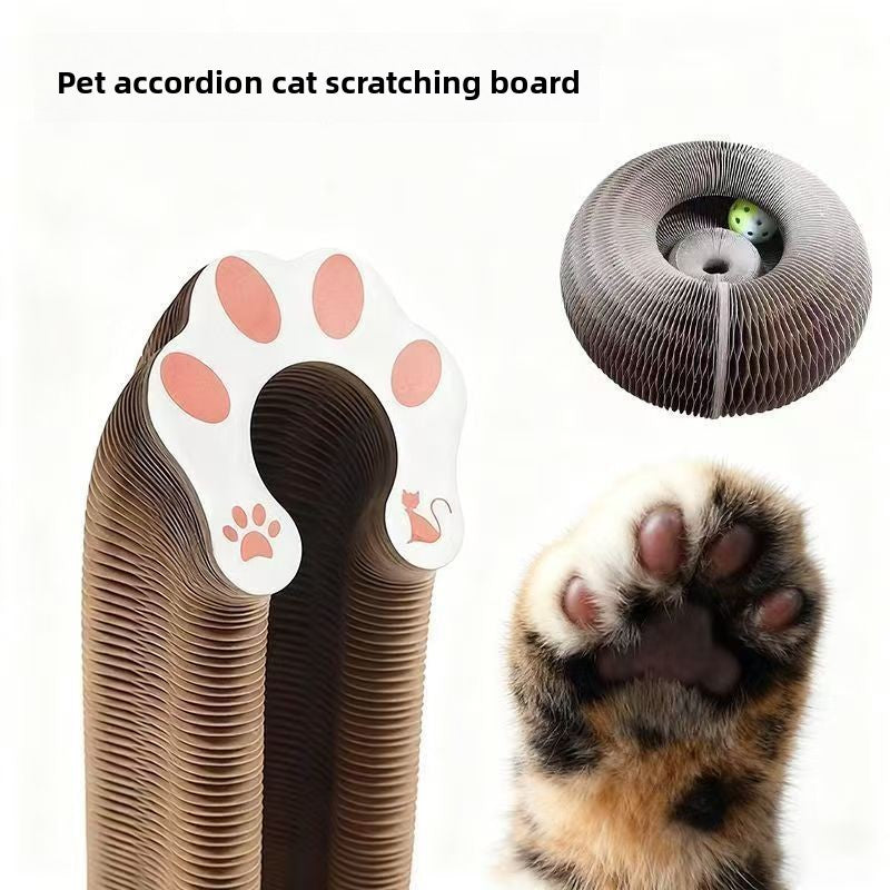 Cat scratching an accordion style corrugated cardboard board - photo 2