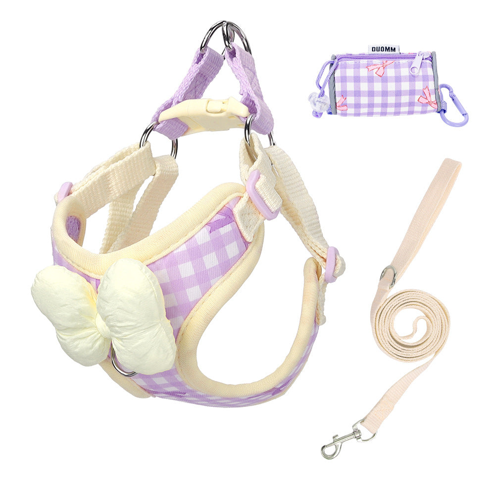 Plaid dog harness and lead with bow, available from Pet Royale UK