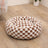 Plush round pet bed in check and floral prints, alternative angle view