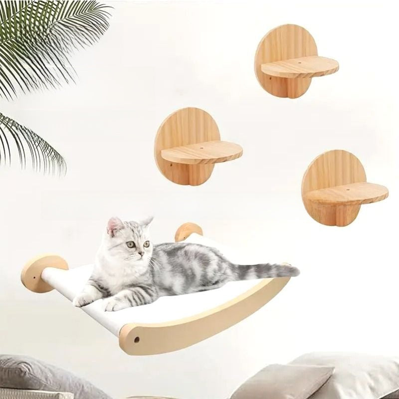 Cat leaping onto a round wall jumping platform