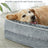 Supportive plush dog bed with removable mat, shown in 7 colours and styles