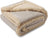 Dog lying on a beige flannel and fleece waterproof throw