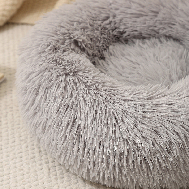 Round plush donut bed for dogs and cats, shown in 12 colours and styles