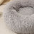 Round plush donut bed for dogs and cats, shown in 12 colours and styles
