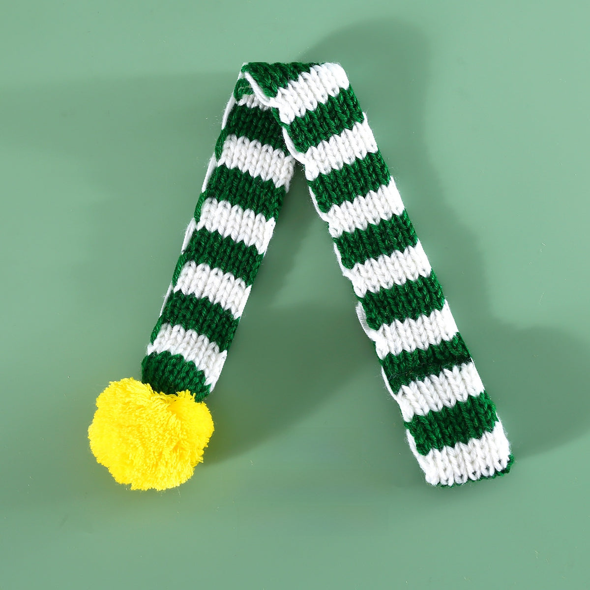Knitted Christmas pet scarf with red and white festive stripes, view 7
