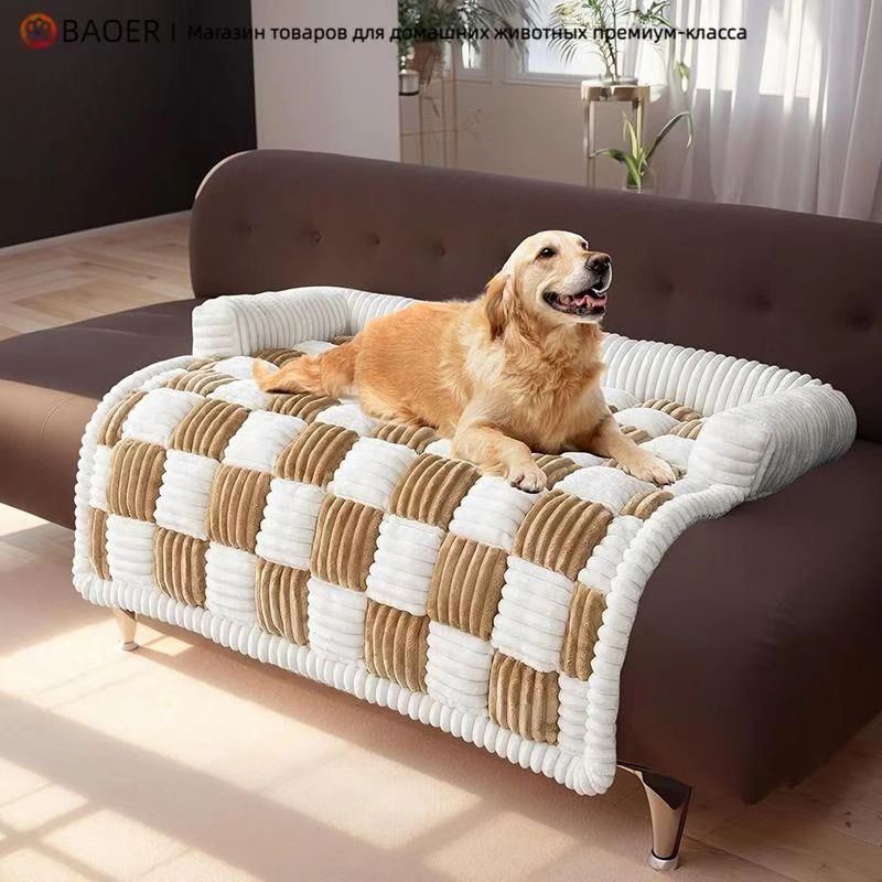 Dog lying on a black and white plush pet mat