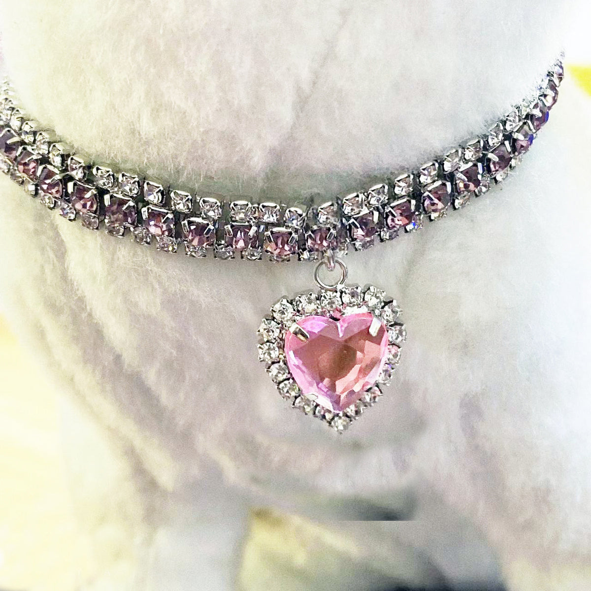 Rhinestone elastic pet collar with charm in Pink Bone, in use with a pet