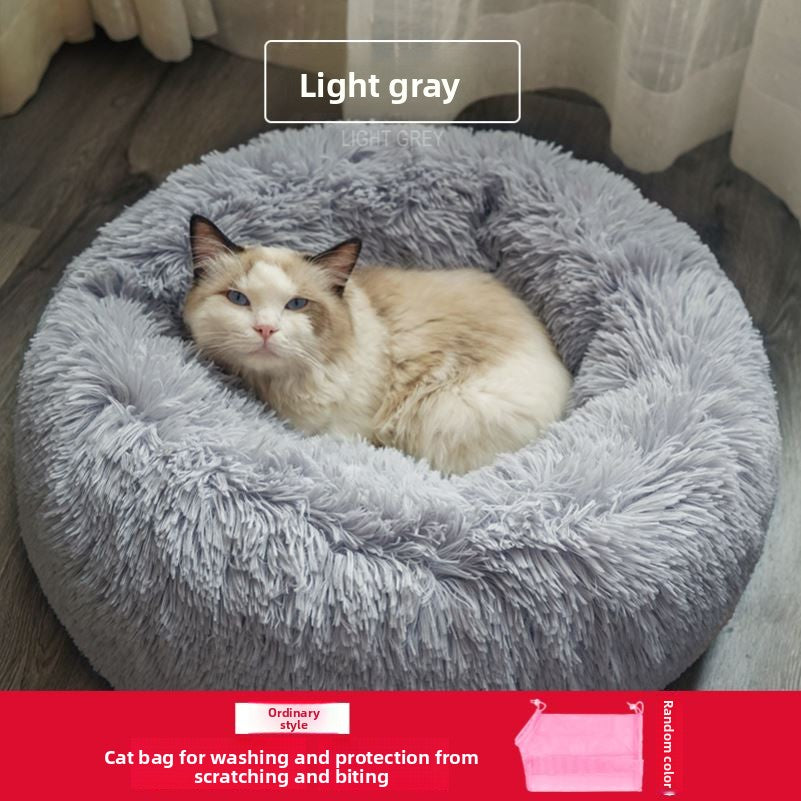 Round plush donut cat bed with raised rim, view 43