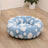 Plush round pet bed in check and floral prints, product gallery photo