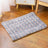 Dog lying on a blue starry sky flannel mat