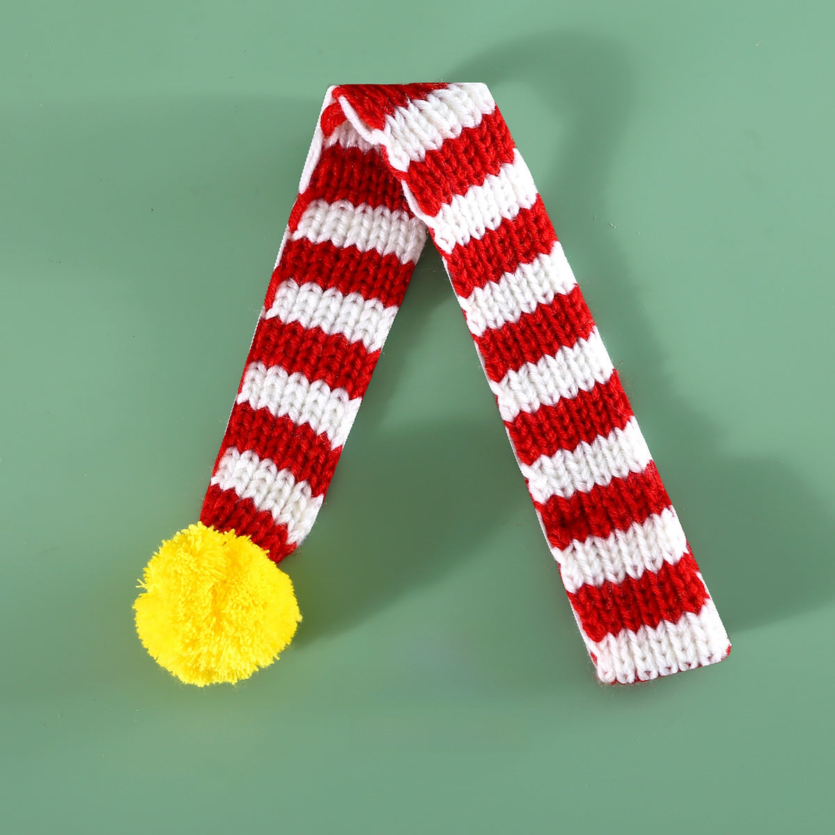 Knitted Christmas pet scarf with red and white festive stripes, view 6