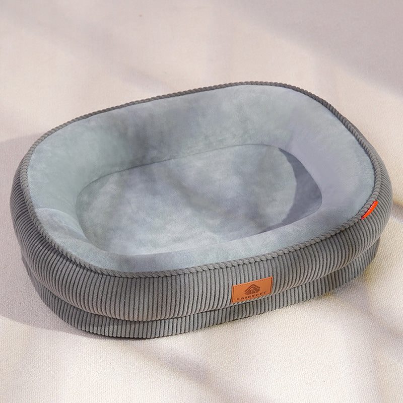Green oval corduroy pet bed with non-slip base, photo 13