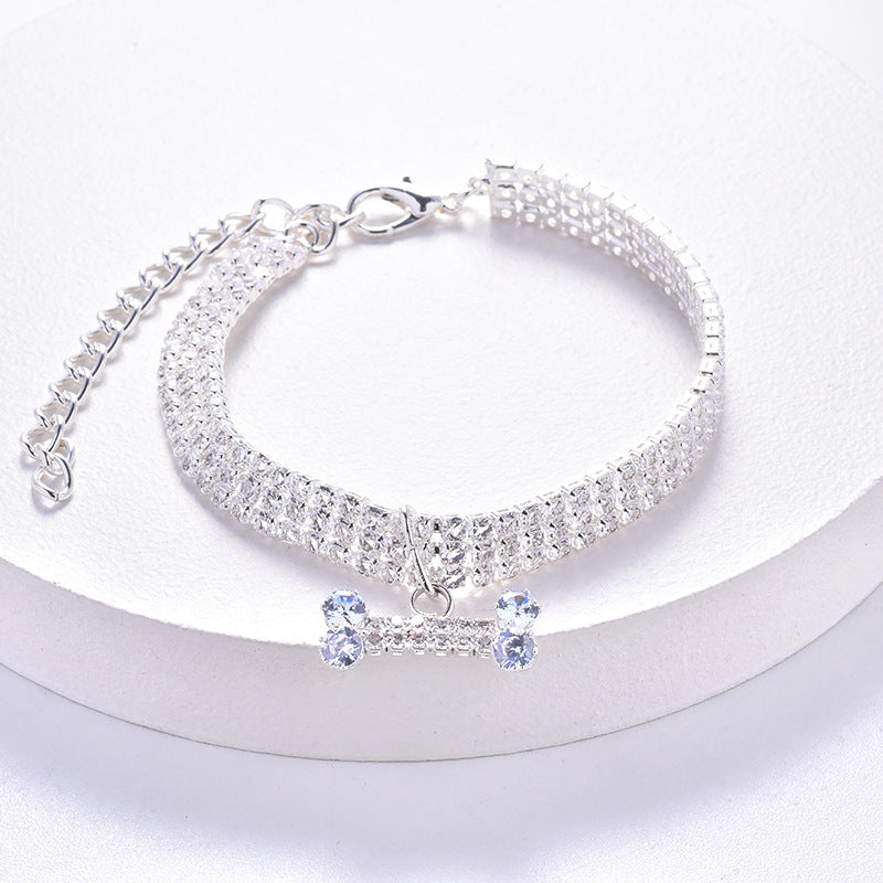Rhinestone pet collar with bone charm, available from Pet Royale UK