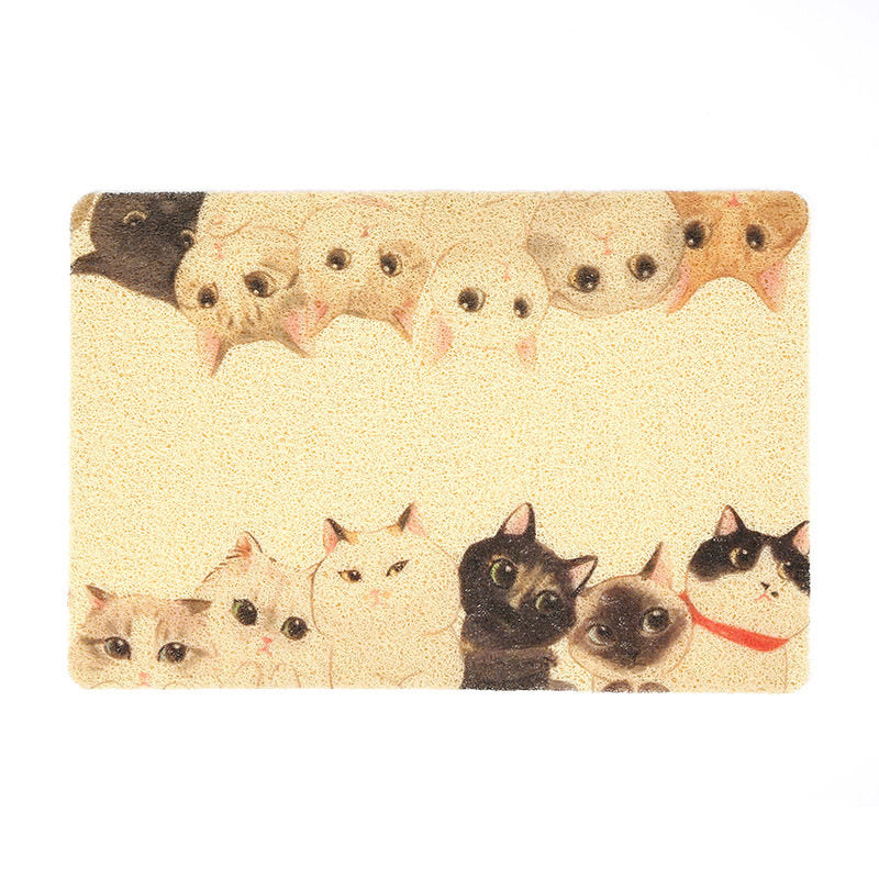 Textured cat litter mat in front of tray, product detail photo
