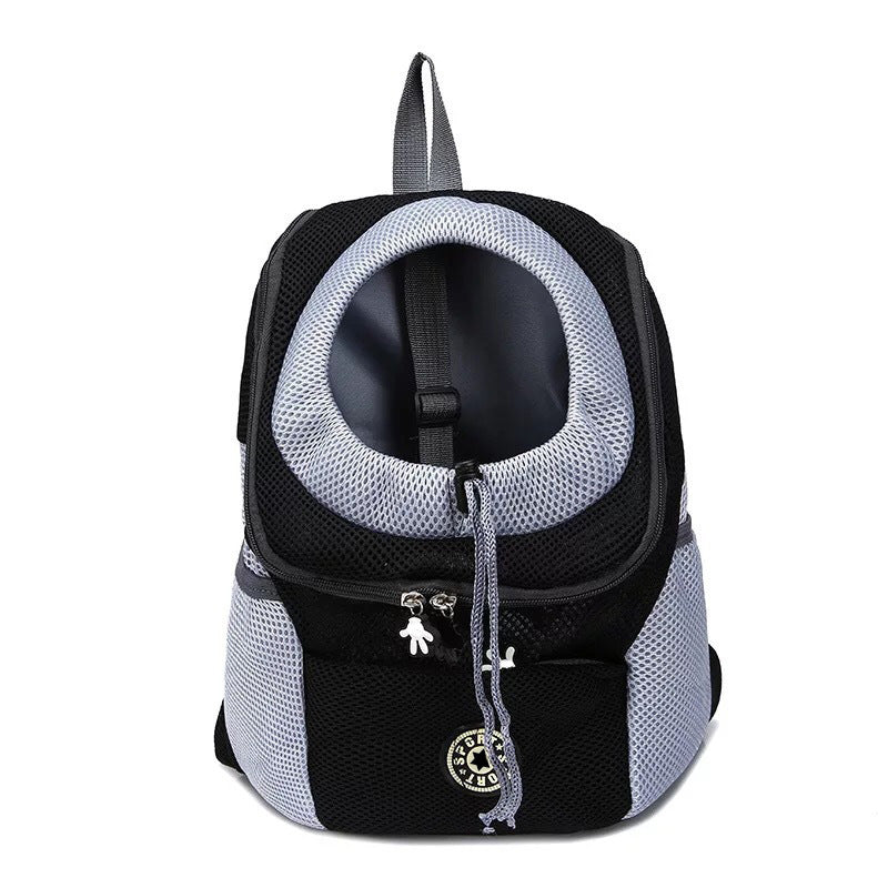 Small dog carried in an orange foldable backpack