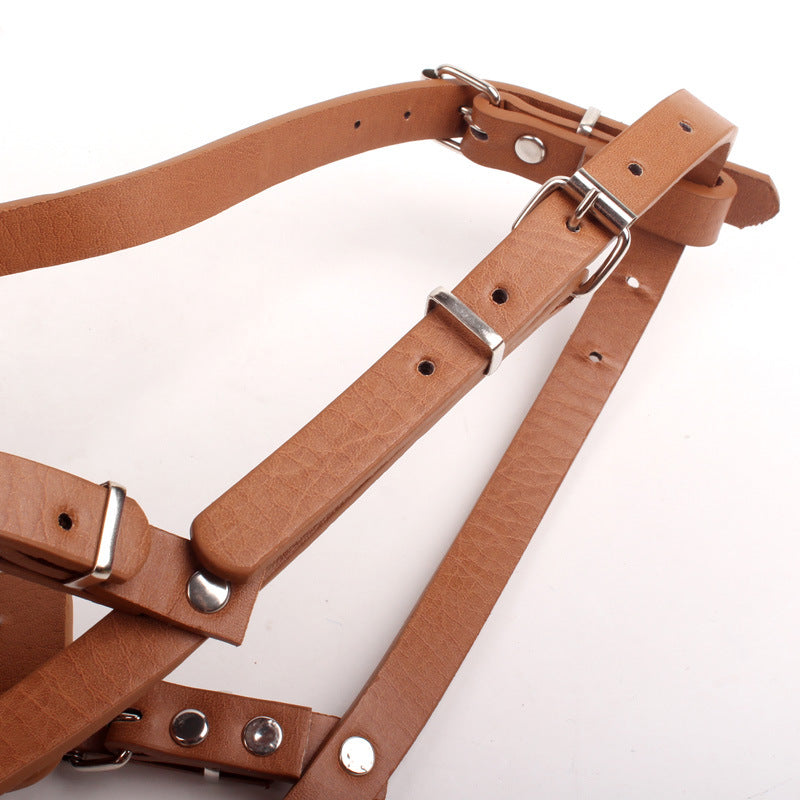 Leather and metal dog muzzle in black with adjustable strap
