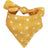 Reversible polyester dog bandana in fun prints in Sun, in a home setting