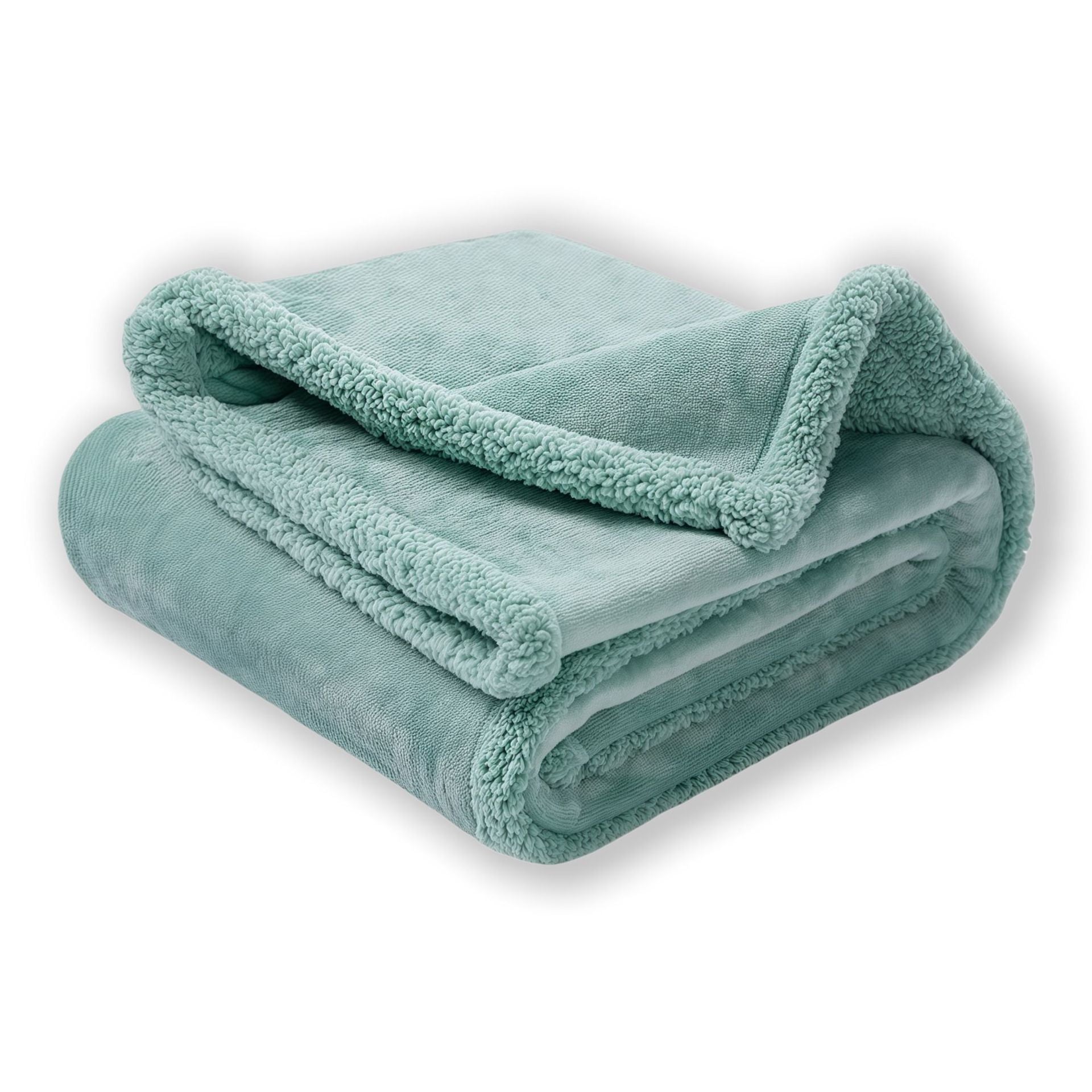 Dog lying on a beige flannel and fleece waterproof throw