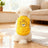 Small dog wearing a cosy blue sherpa fleece bear vest