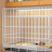 Small dog crate with separate toilet area, alternative angle view
