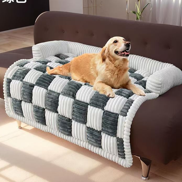 Dog lying on a black and white plush pet mat