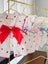 Princess bow cotton cat dress in Blue, in a home setting