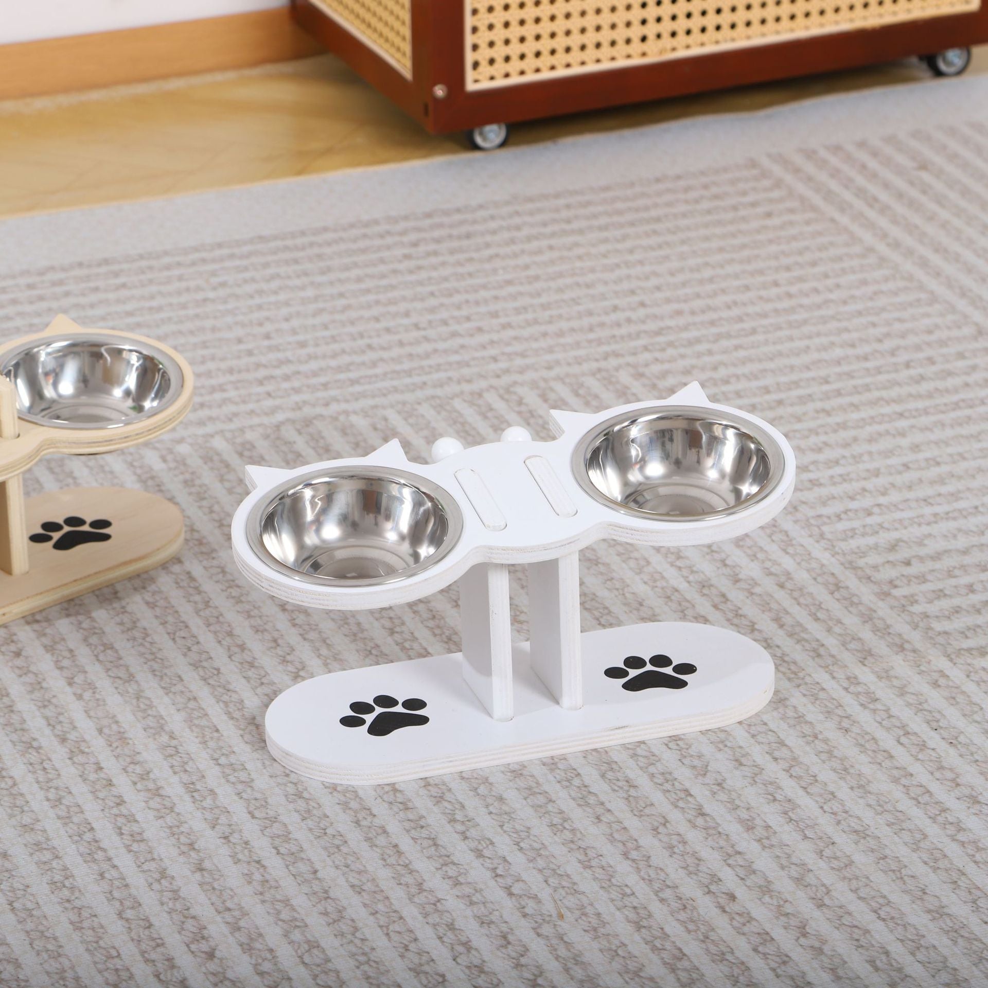 Black raised dog bowl stand with two tilted bowls