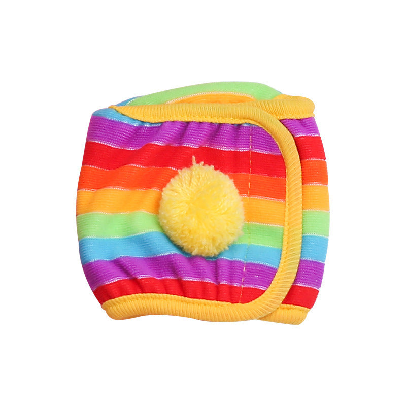Washable cotton male dog belly band in Rainbow Stripe, close-up detail