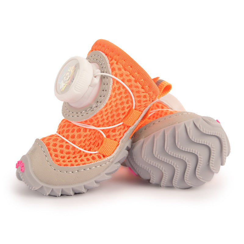 Soft sole small dog shoes with anti-slip Oxford base, in use with a pet