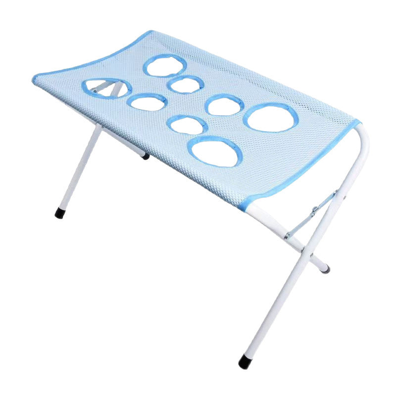Deep space grey bathing rack supporting a dog during a bath
