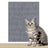 Dark blue cuttable scratch mat protecting a sofa