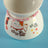 Elevated Ceramic Cat Feeding Bowl with Slanted Mouth and Matching Necklace