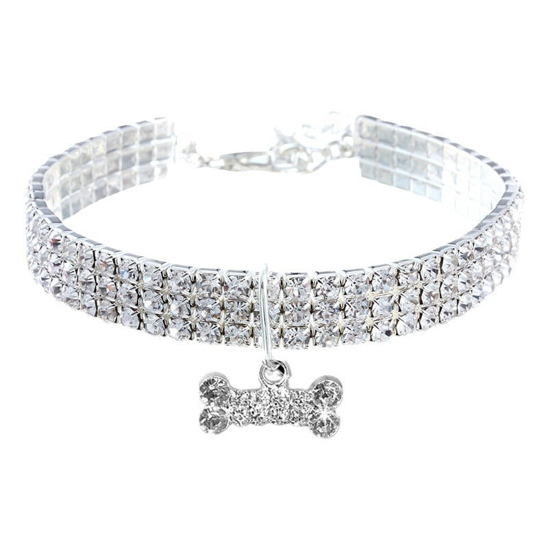 Three row rhinestone elastic collar in pink on a small dog