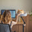 Light grey floating desktop cat bed on black wooden stand, photo 3