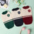 Knitted preppy V-neck pet jumper vest in V-Neck Grey, in a home setting