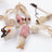 Interactive 7 piece cat toy set with feather teaser and bell, view 3