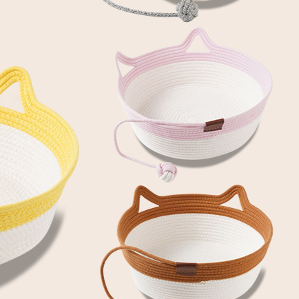 Rattan woven cat nest with ball toy and cream pad, view 4